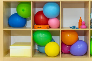 open shelving and storage for toys.